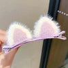 Handmade cute solid rabbit ears hair clips for baby girls in purple and white, perfect for kids' hair accessories.