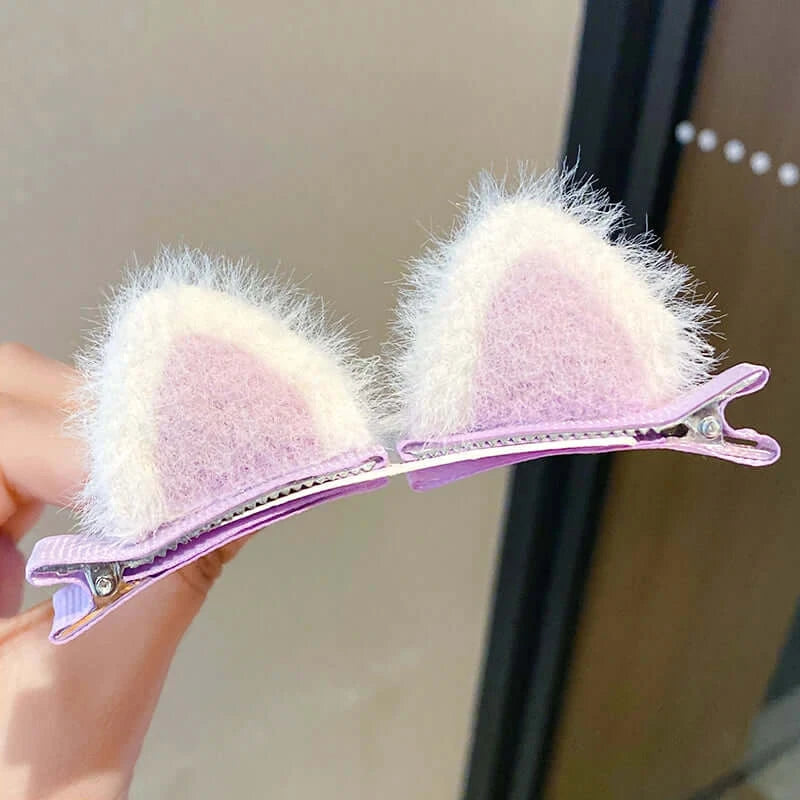 Handmade cute solid rabbit ears hair clips for baby girls in purple and white, perfect for kids' hair accessories.
