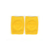 Yellow baby knee pads with smiley face design for crawling infants and toddlers, perfect for leg protection.