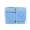 Light blue baby knee pads for kids with text 'Kids Socks' and a circular design, perfect for crawling and safety.