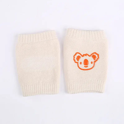 Baby knee pads with koala design, non-slip crawling cushion for toddlers, cotton leg warmers for boys and girls.