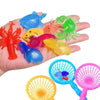 Colorful plastic sea creatures and nets perfect for kids' bath play, featuring a variety of fun and vivid aquatic toys.