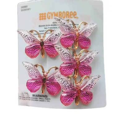 Set of 5 cute pink butterfly hairpins for girls, ideal for children's accessories and headwear.