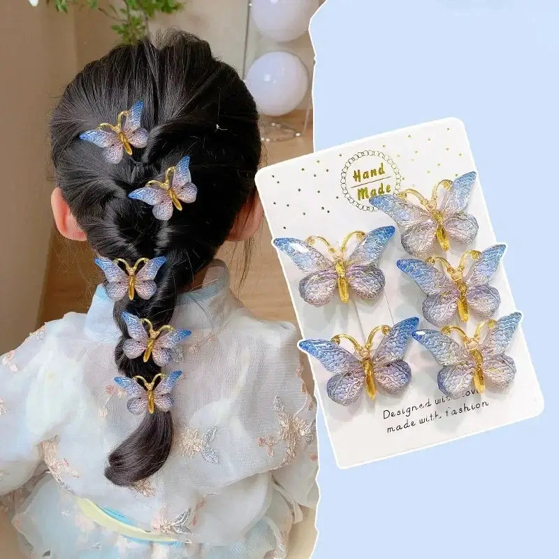 Cute butterfly hairpins for girls, featuring a gradient color design, perfect for children's hairstyles.