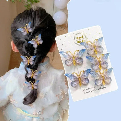 Cute butterfly hairpins for girls, featuring a gradient color design, perfect for children's hairstyles.