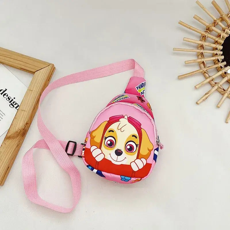 Pink Paw Patrol chest bag featuring a cartoon dog design, perfect for kids' outdoor activities and costume accessories.