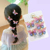 5PCS butterfly hairpins in color gradient, styled in a girl's hair, perfect for kids' accessories and headwear.