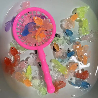 Colorful simulation rubber goldfish in a pink scoop, ideal for toddler bath play and water games.