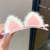 Cute handmade rabbit ears hair clips for baby girls, soft fleece material and pink accents, perfect kids' accessories.