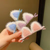 Handmade cute solid rabbit ears clips in pink and blue for baby girls, perfect hair accessories for kids aged 4-6 years.